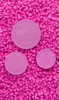 Tokens made from recycled chewing gum waste
