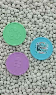 Tokens made from recycled plastic