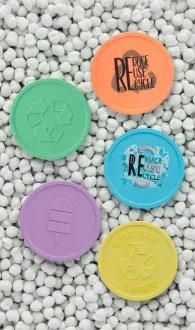 Tokens made from recycled plastic