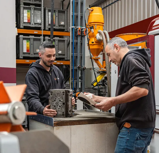 Injection molding team in the b-token production